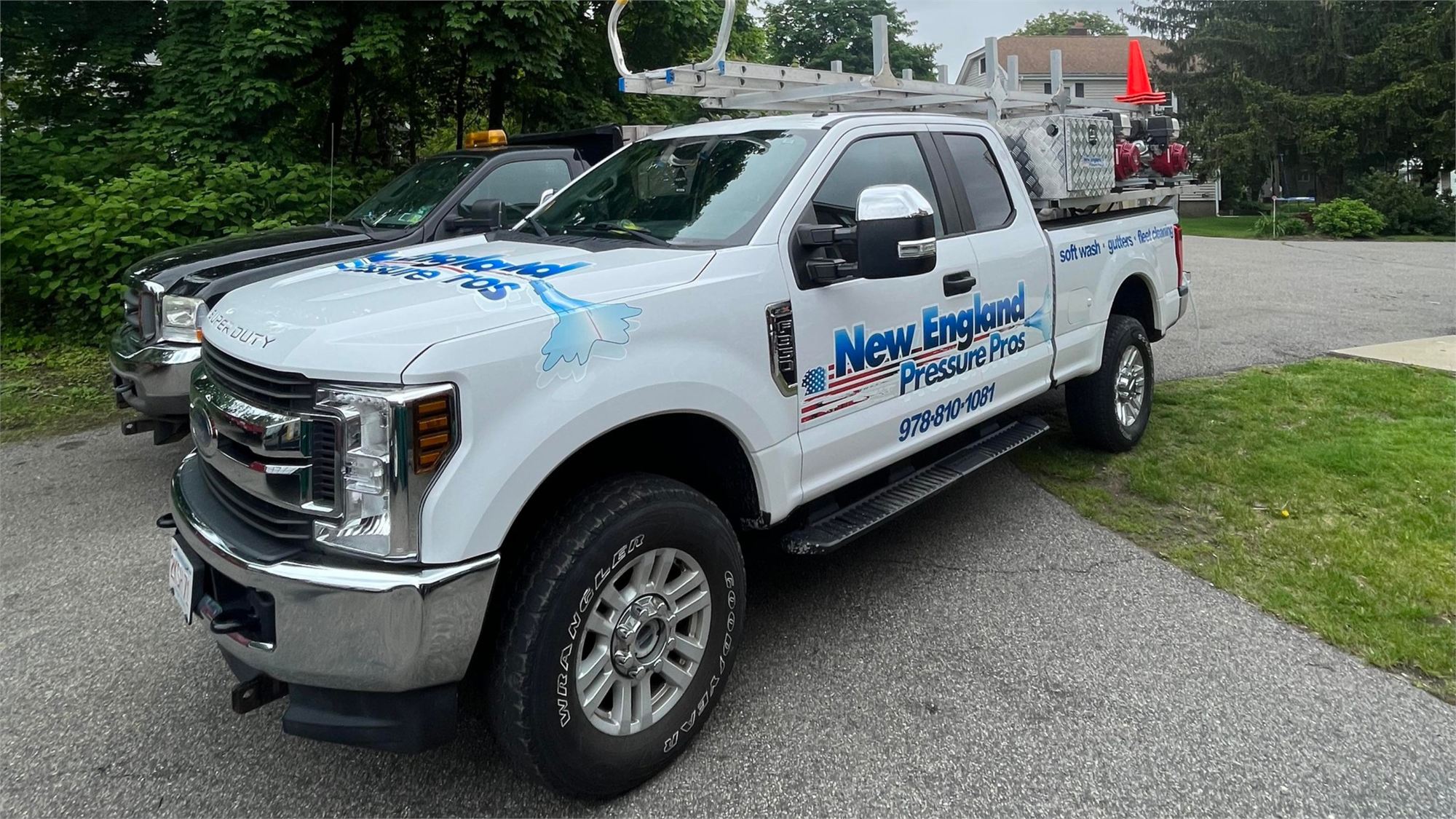 New England Pressure Pros work truck, lettered for soft wash, gutters and fleet cleaning