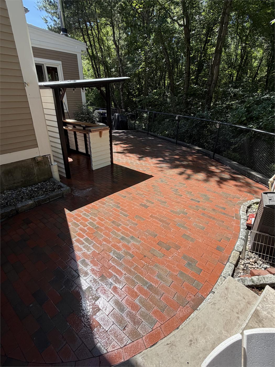 The same brick patio with its red color back