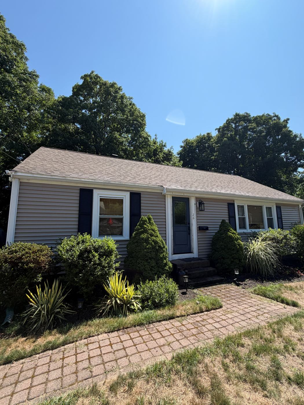 The same ranch house and walkway after washing