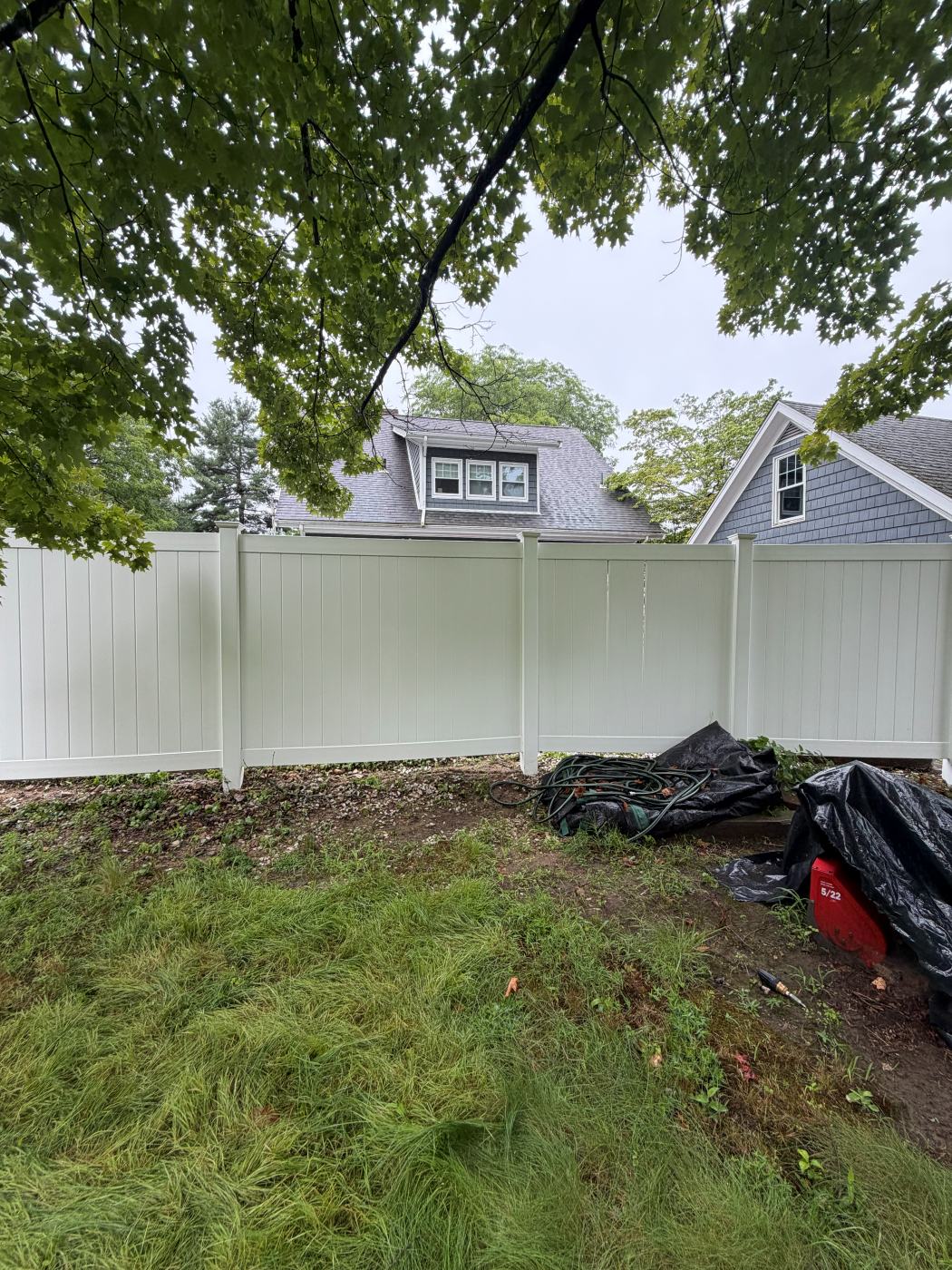 The same vinyl fence clean and white