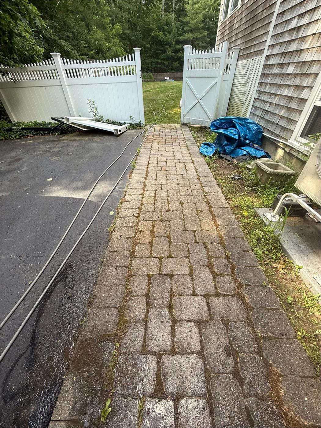 The same walkway with clean, even pavers