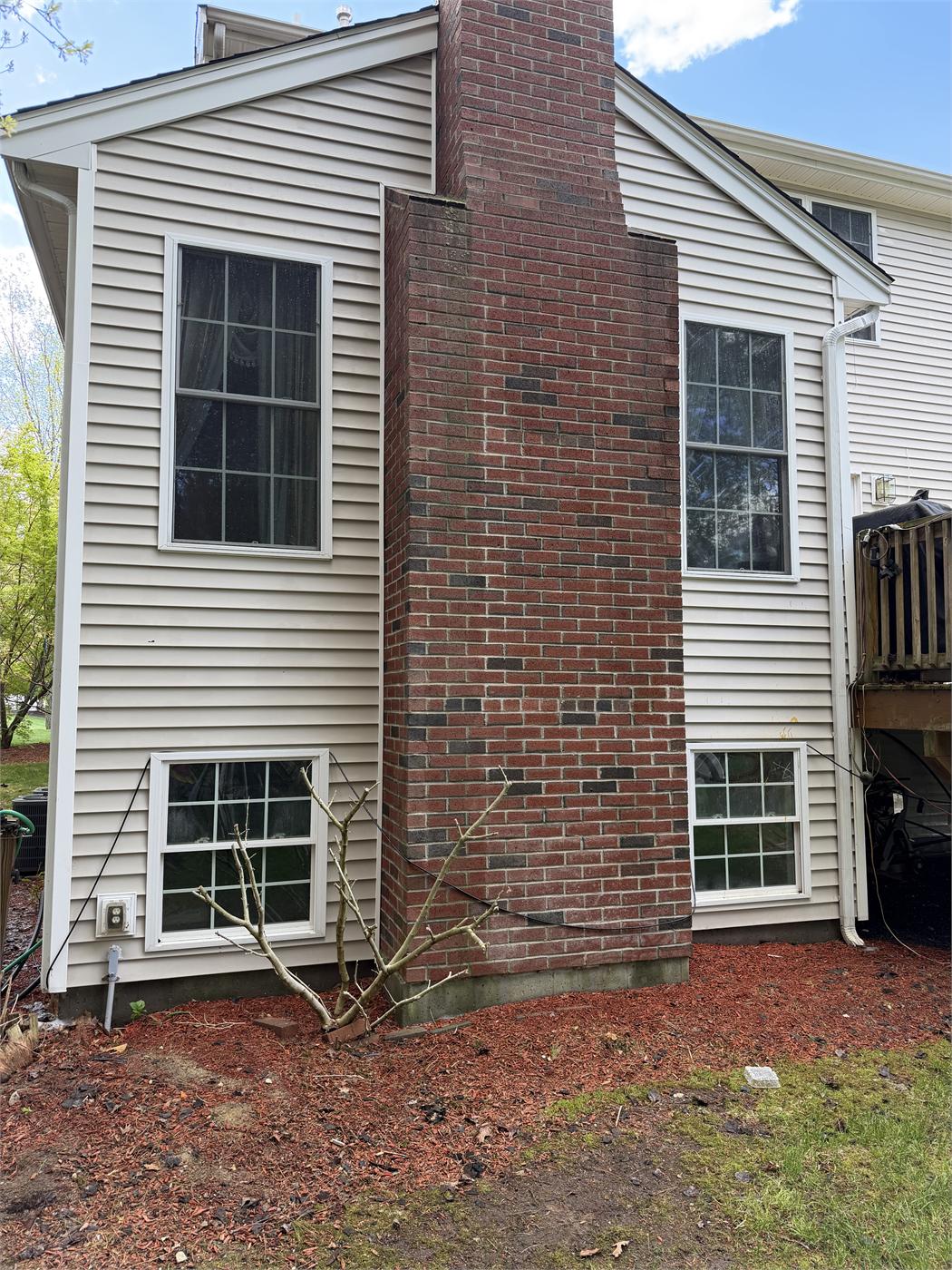 The same siding and chimney after washing