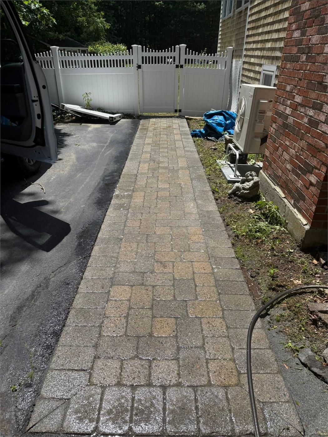 Paver walkway covered in grime before cleaning